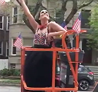 Singer in cherry picker