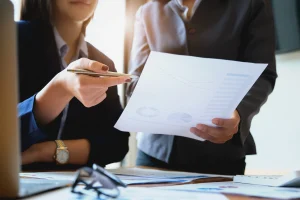 Professional reviewing tax document
